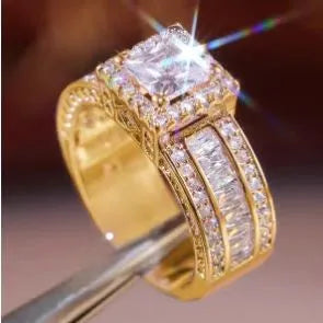 Geometric sweet and cool style alloy ring in gold or white electroplated finish.