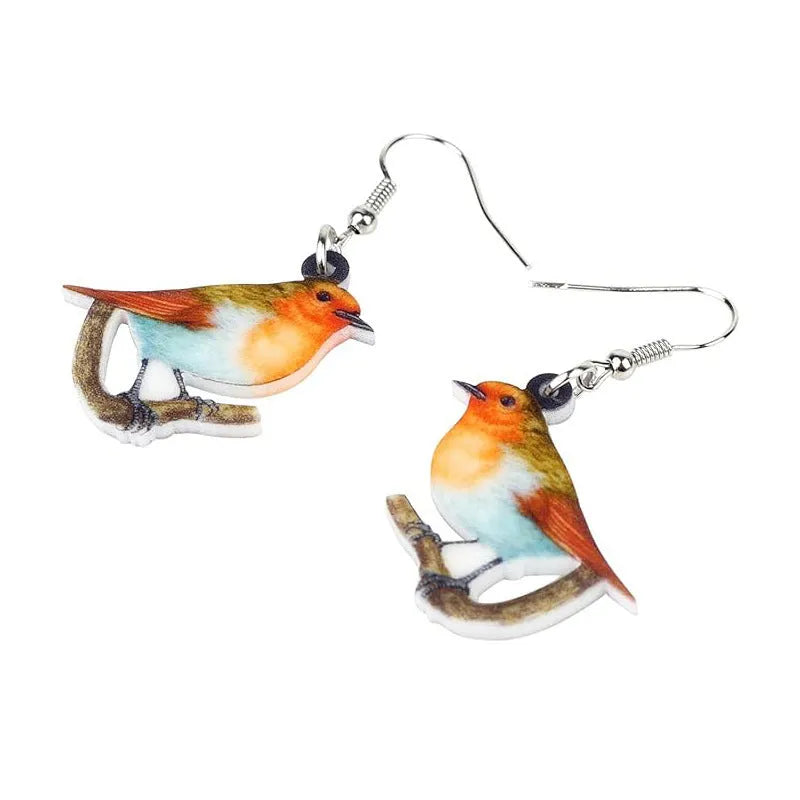 Acrylic geometric pendant earrings with a printed blue titmouse and snake chain design.