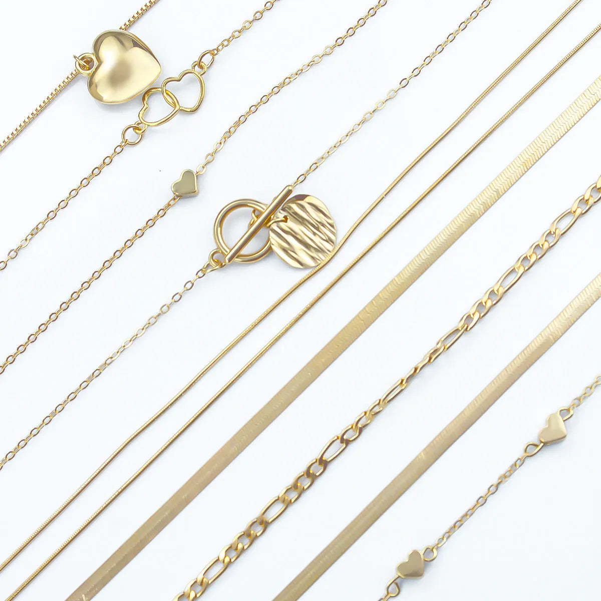10-piece women's gold necklace set with snake bone chain and alloy pendants