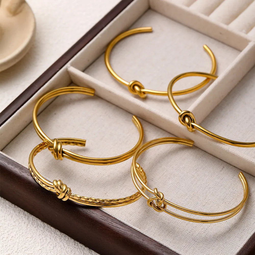Adjustable C-shaped double-layer bracelet with knotted detail and 18K gold plating