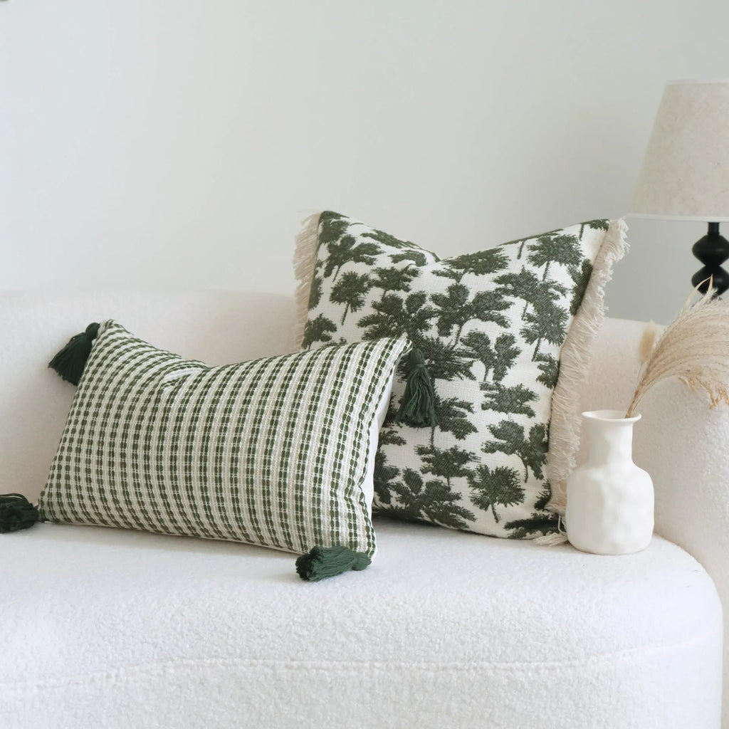 Green decorative hotel pillow set with striped and leafy patterns, shown with a matching pillow core.