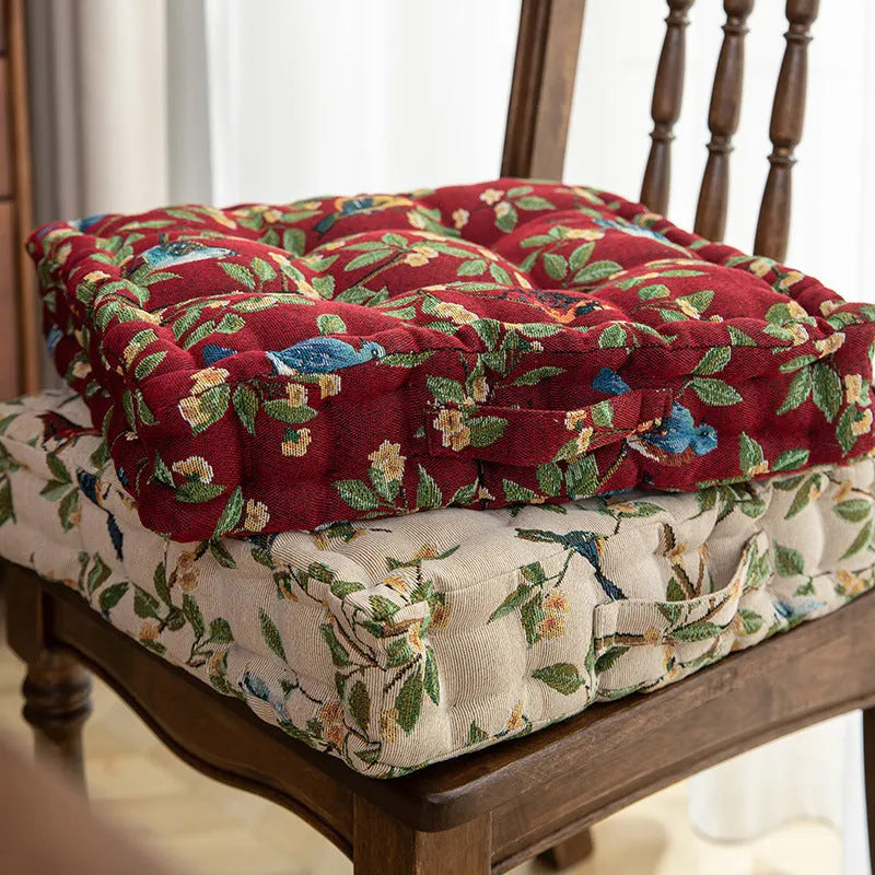 American dining chair cushion 40x40x8cm in apricot floral pattern on a chair.