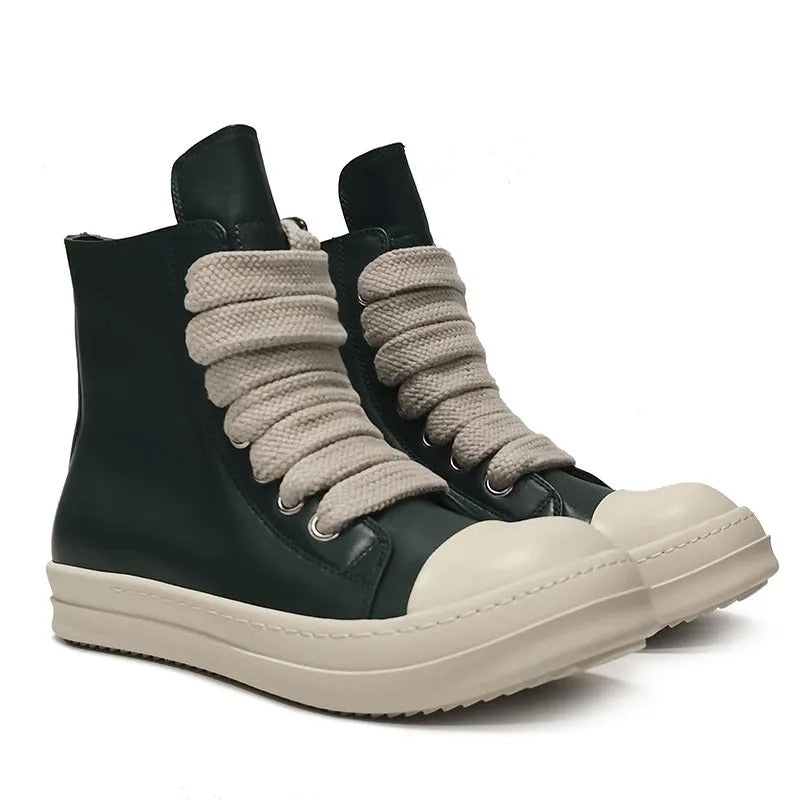Black high-top leather sneakers with side zipper and round toe on a rubber sole.