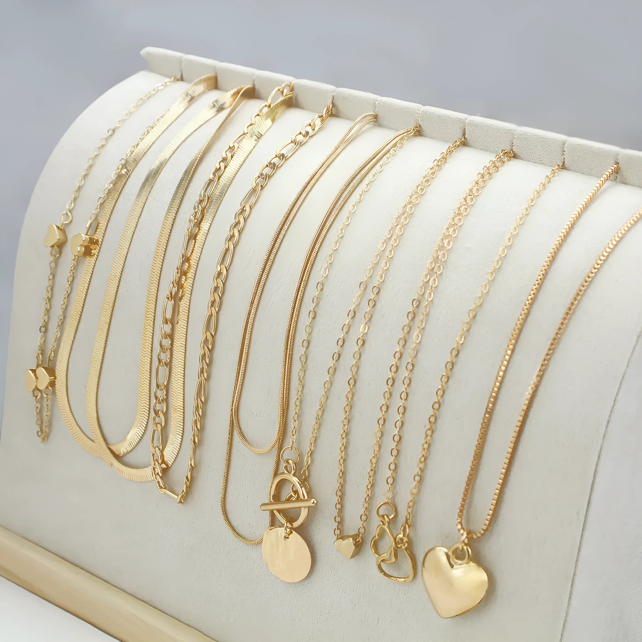 10-piece women's gold necklace set with snake bone chain and alloy pendants