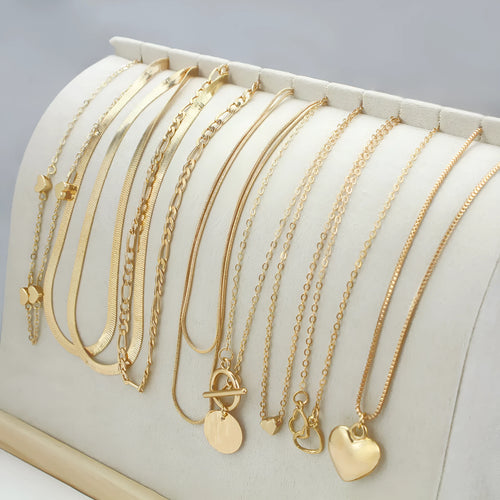 10-piece women's gold necklace set with snake bone chain and alloy pendants