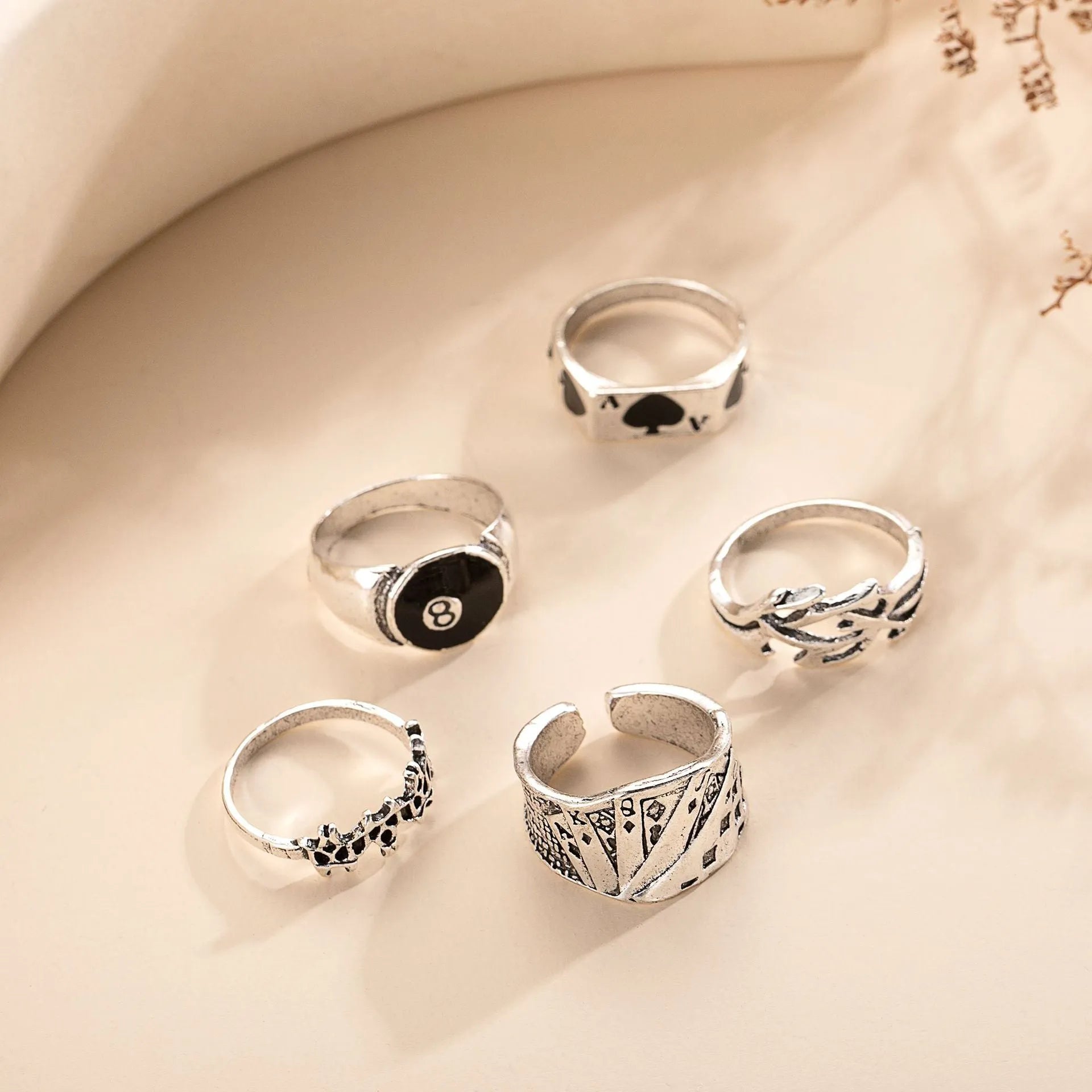 Black alloy ring with a raised retro spade card design on its face.