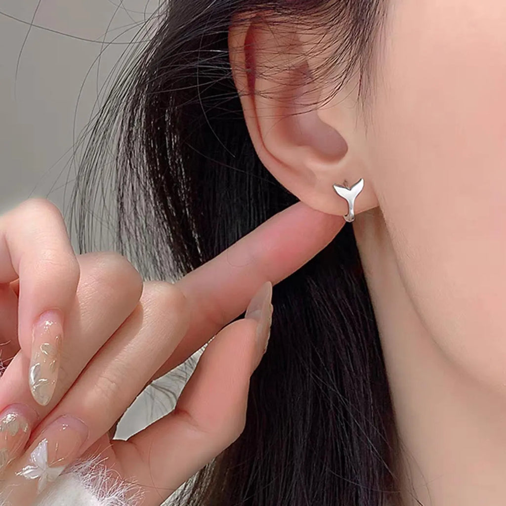 Women's copper fishtail earrings with electroplated white gold or yellow gold finish