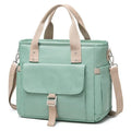 Insulated cube-shaped picnic bag with a removable shoulder strap and a side pocket, shown in pink colour.