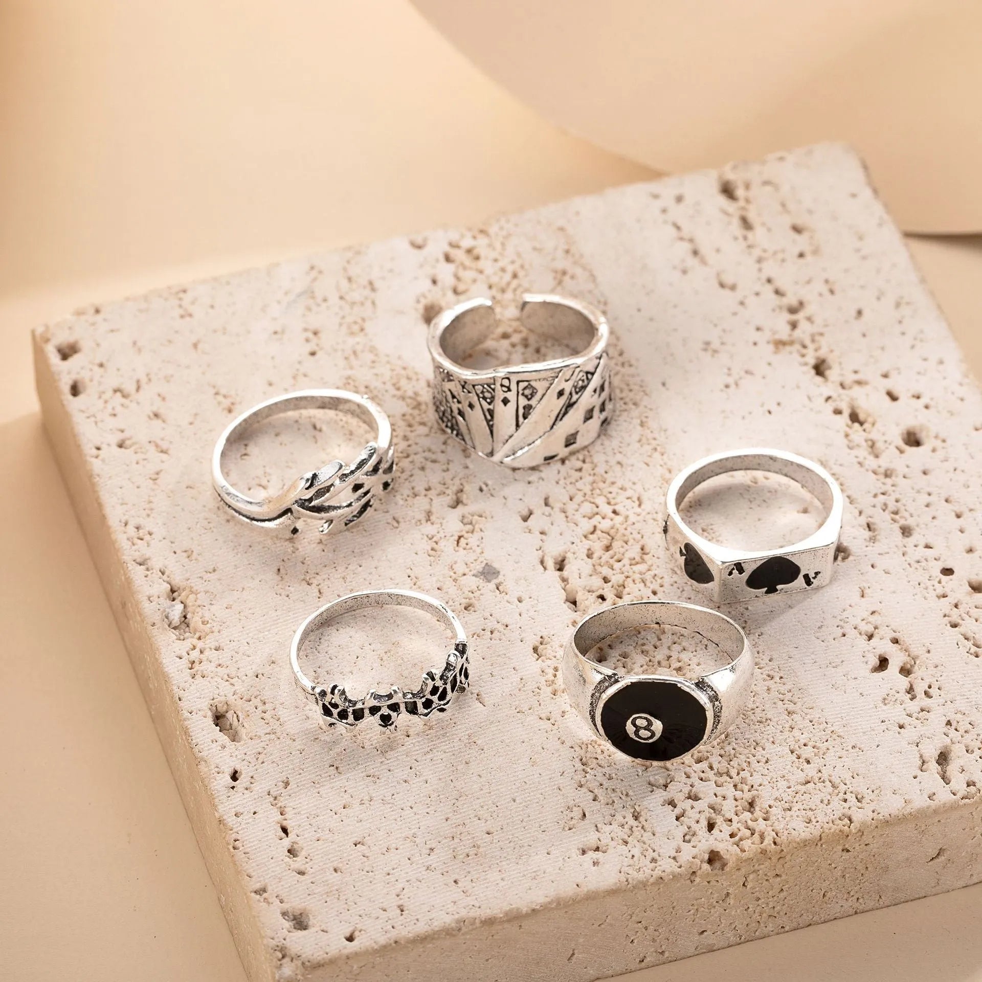Black alloy ring with a raised retro spade card design on its face.