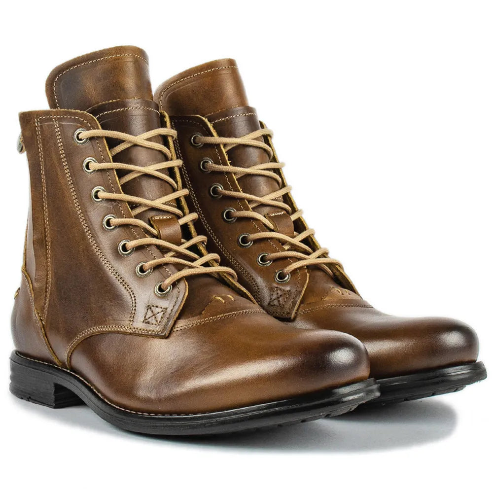 Men's black and brown two-tone leather ankle boots with a side zipper and low heel.