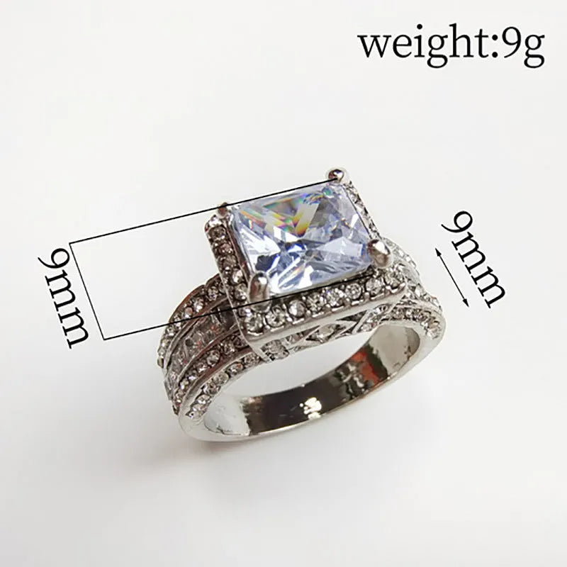 Geometric sweet and cool style alloy ring in gold or white electroplated finish.
