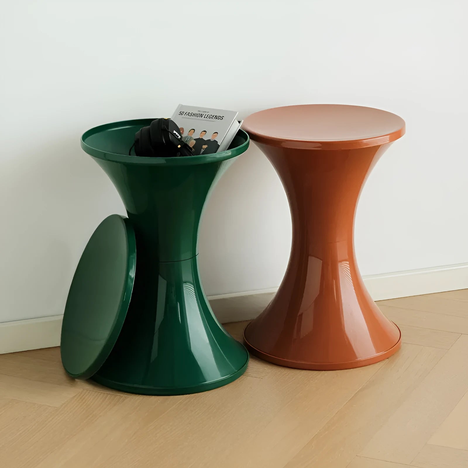 A plastic hourglass-style shoe changing stool shown in one of five available colours: black, green, red, white, or brown.