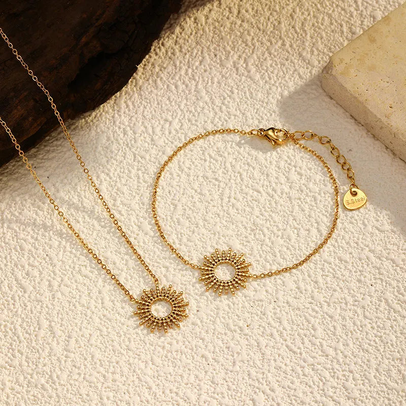 Sunflower theme jewellery set with geometric chain necklace and bracelet in gold colour