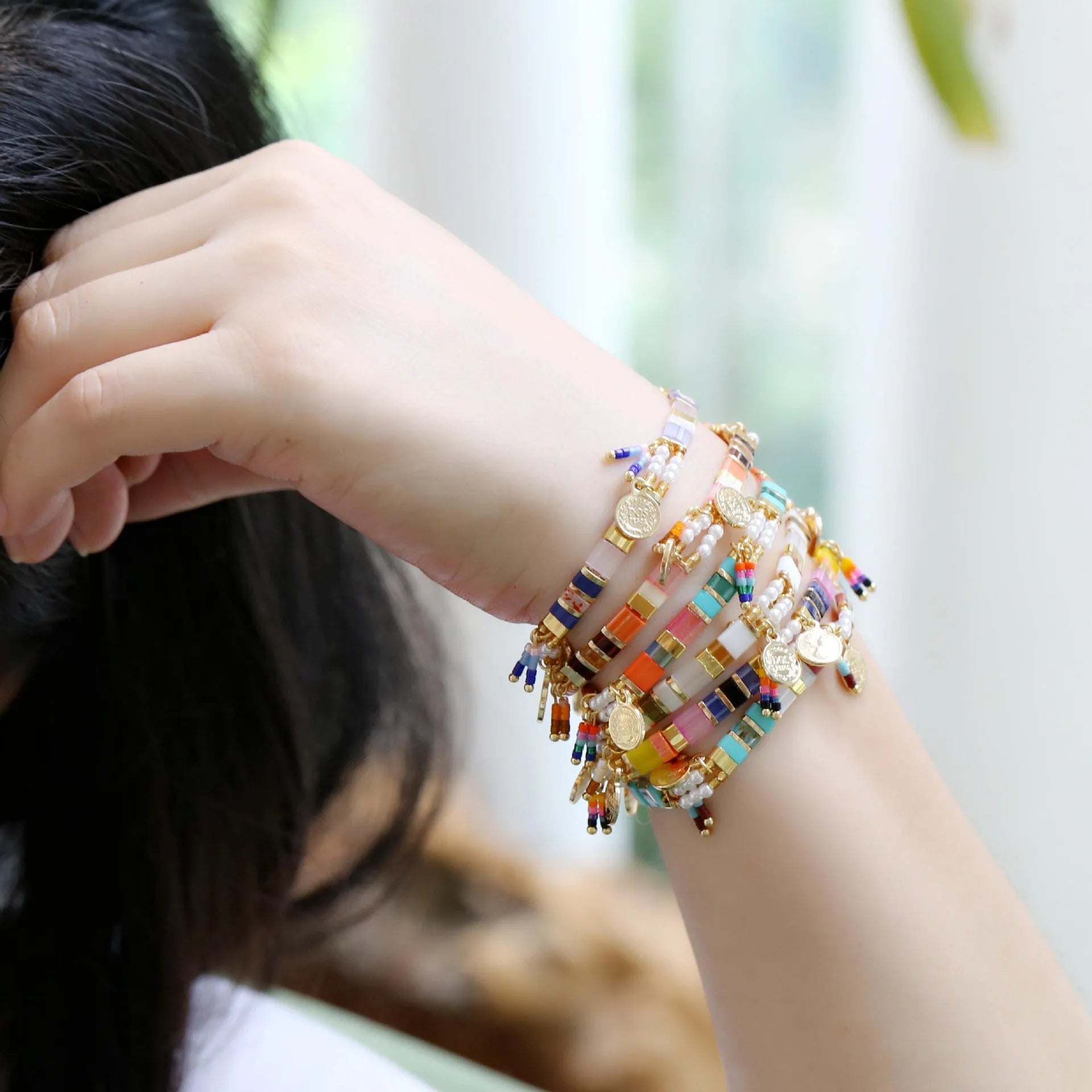 Women's handcrafted beaded bracelet with imitation pearls in original design