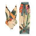 Solid colour women's one-piece swimsuit with thin spaghetti straps and a separate matching swim skirt.