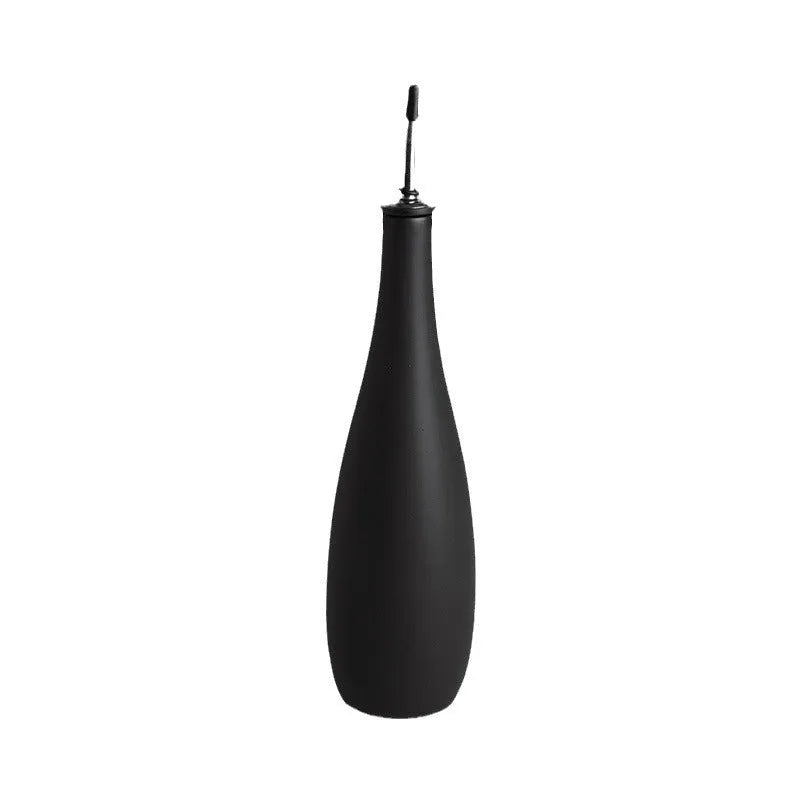 Ceramic oil pot with attached brush in black, coffee or white colours for kitchen oil storage