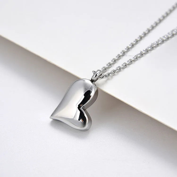 Silver curved peach heart stainless steel pendant necklace with adjustable chain