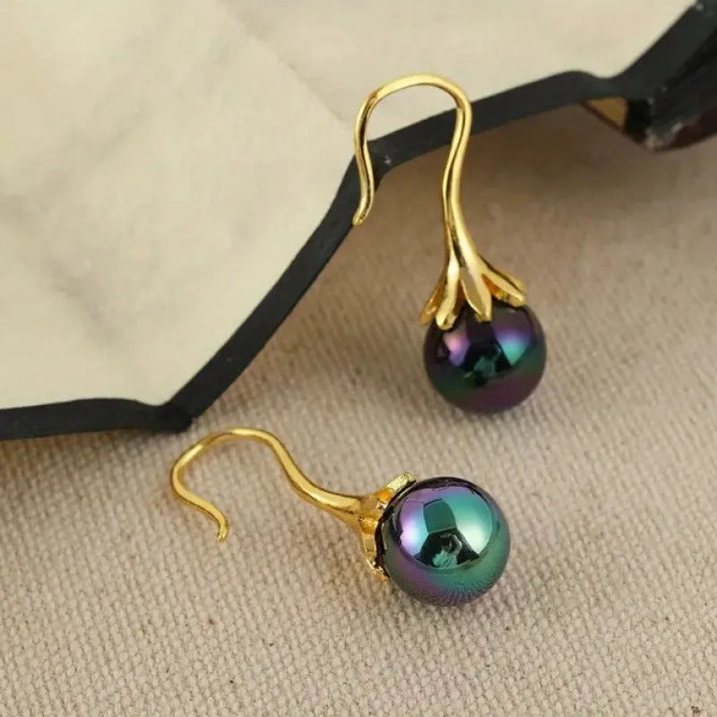 Women's retro design alloy earrings with imitation gold electroplating finish