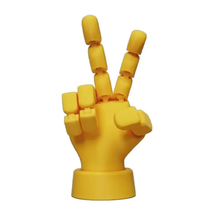 Yellow PLA movable joint hand ornament prop for decorative display.