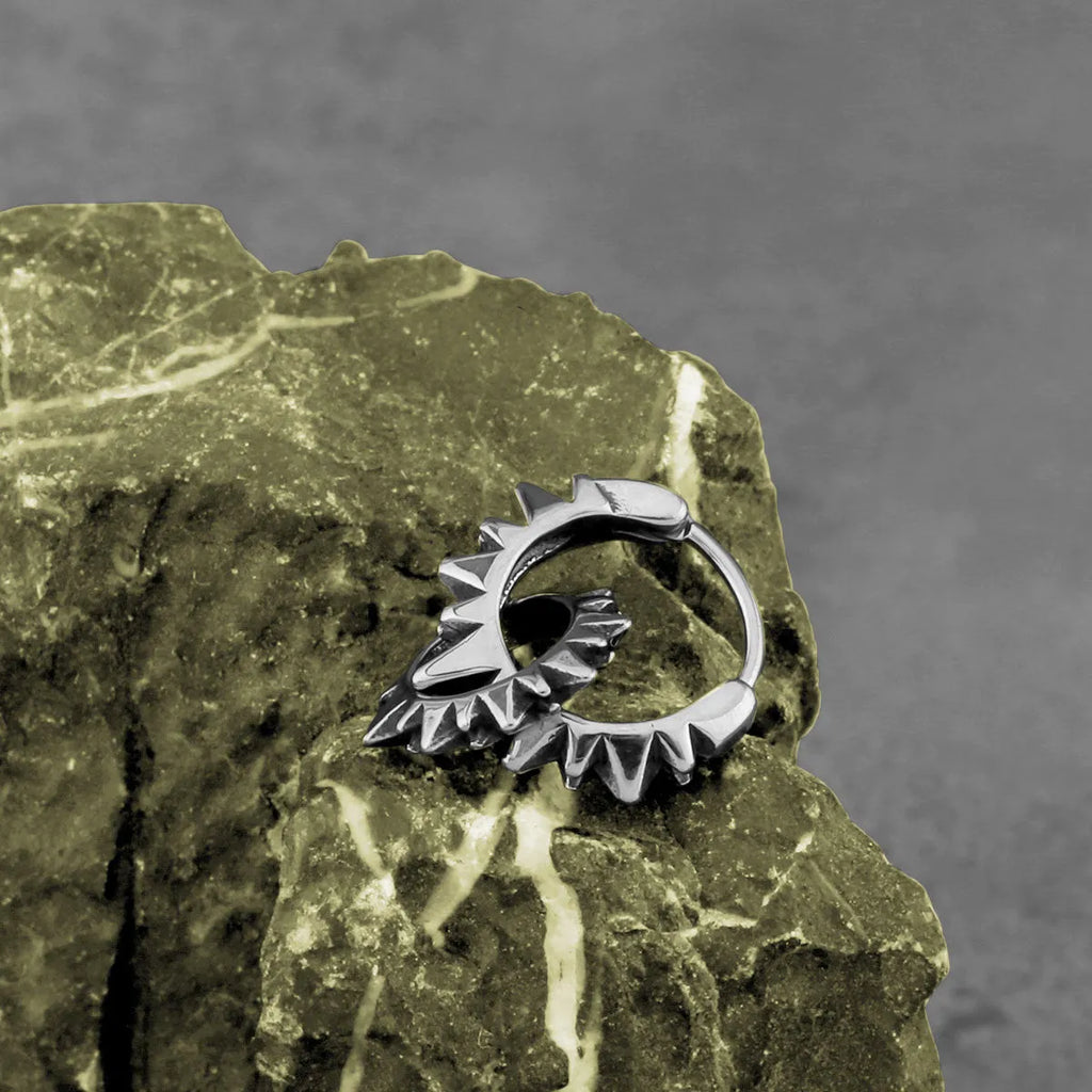 Polished stainless steel round ring earrings with retro circular design in steel colour