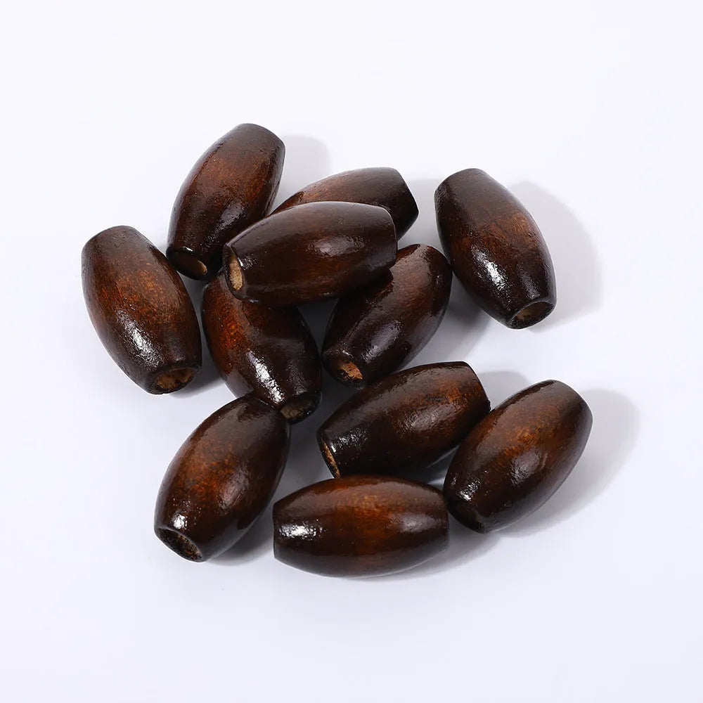 Dark coffee coloured oval wooden bead with M-shape profile, showing 6mm hole.