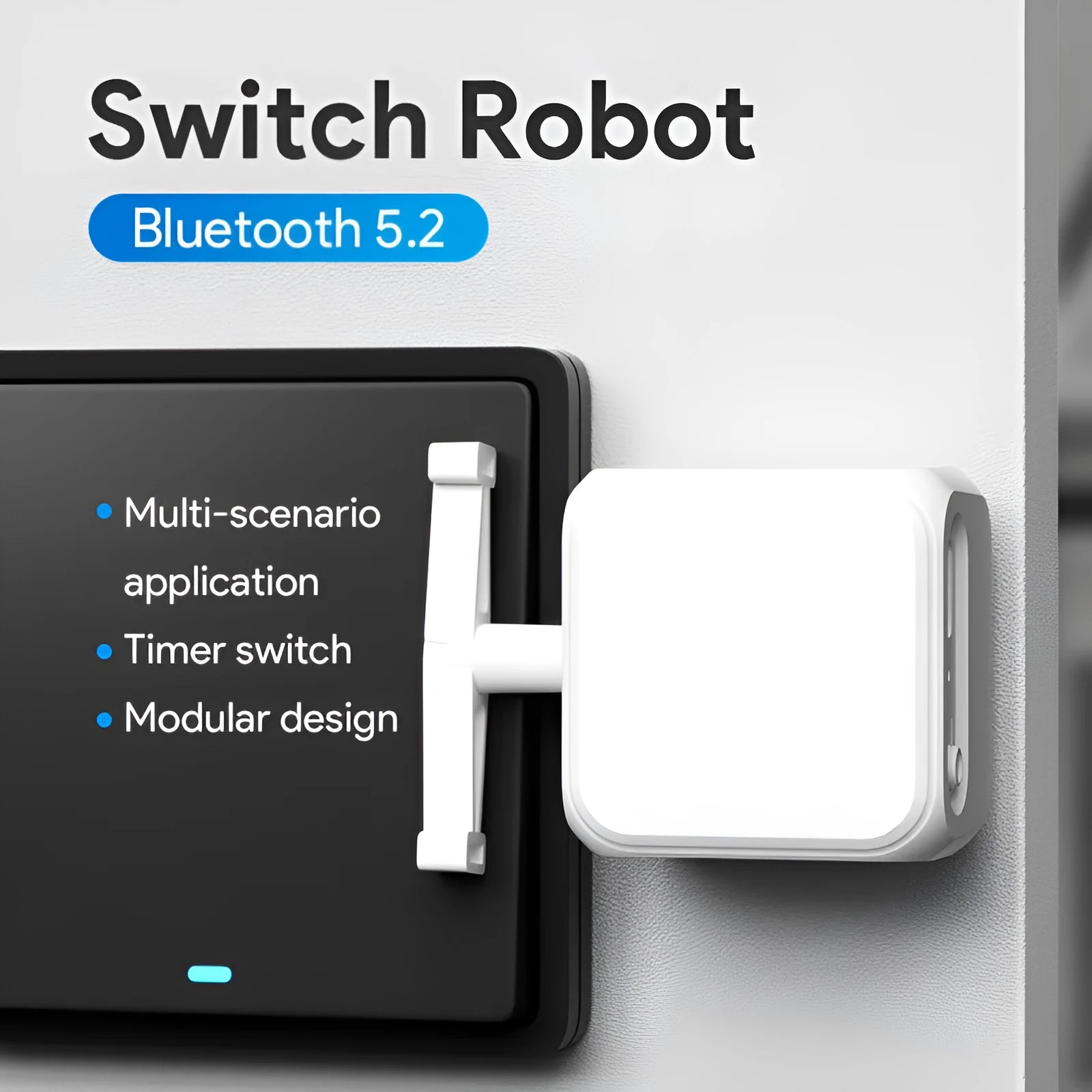 Small white Bluetooth rocker arm finger robot remote control on a surface.