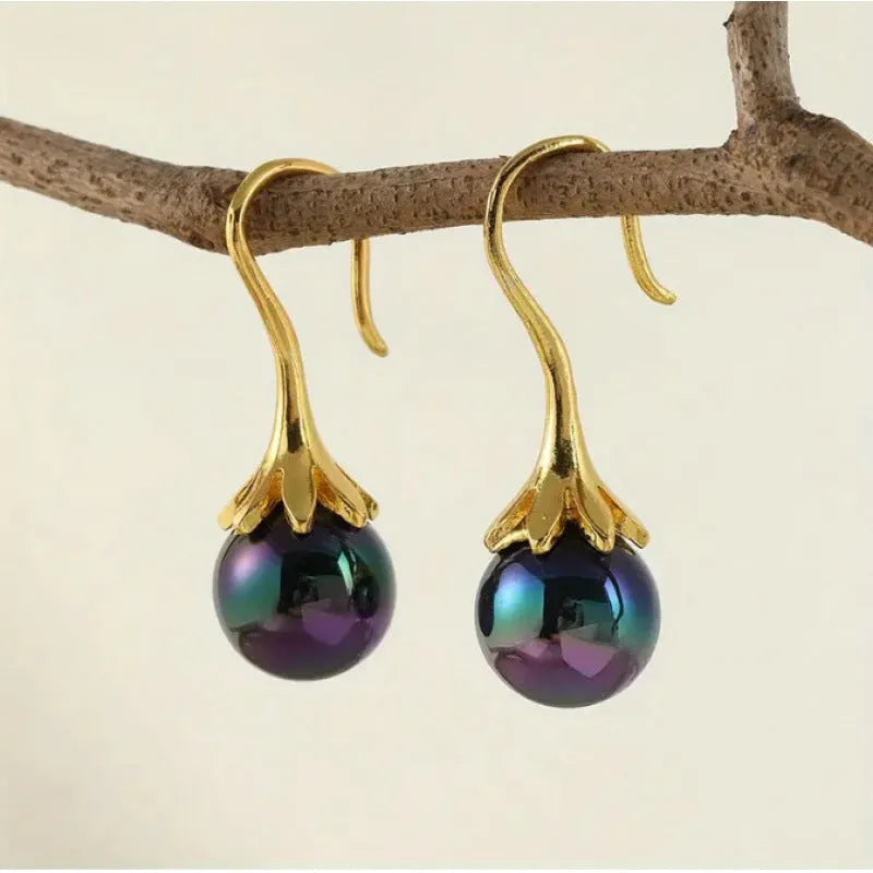 Women's retro design alloy earrings with imitation gold electroplating finish