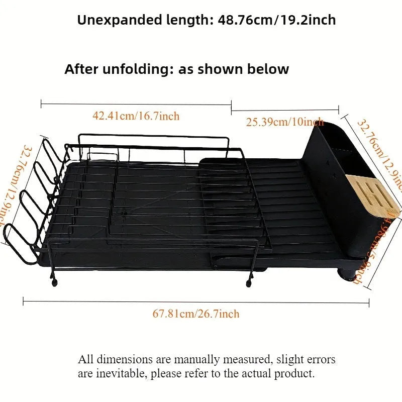 Modern foldable carbon steel dish drain rack for cutlery and cups on a wall.