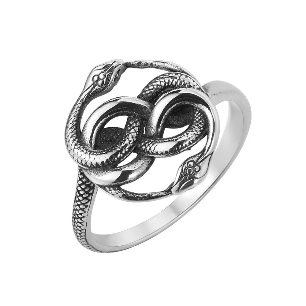 A titanium steel men's snake ring in steel colour showing a detailed twisted retro design on a finger.