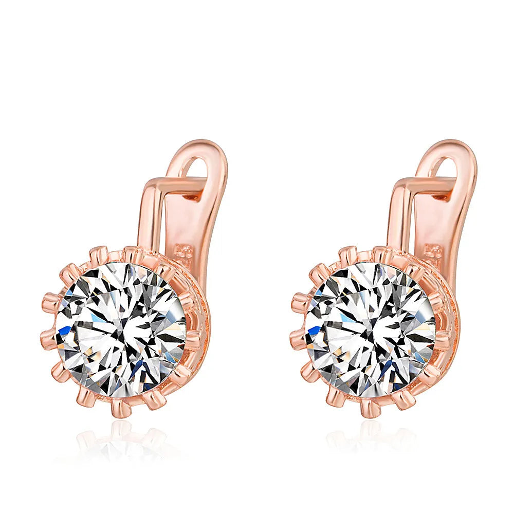 Korean retro crown-shaped ear clip earrings in rose gold or white gold colour with white diamond details.