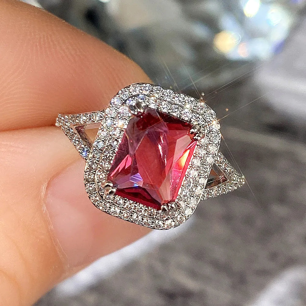 Red copper square ring with rhinestones for women, shown in size 8.