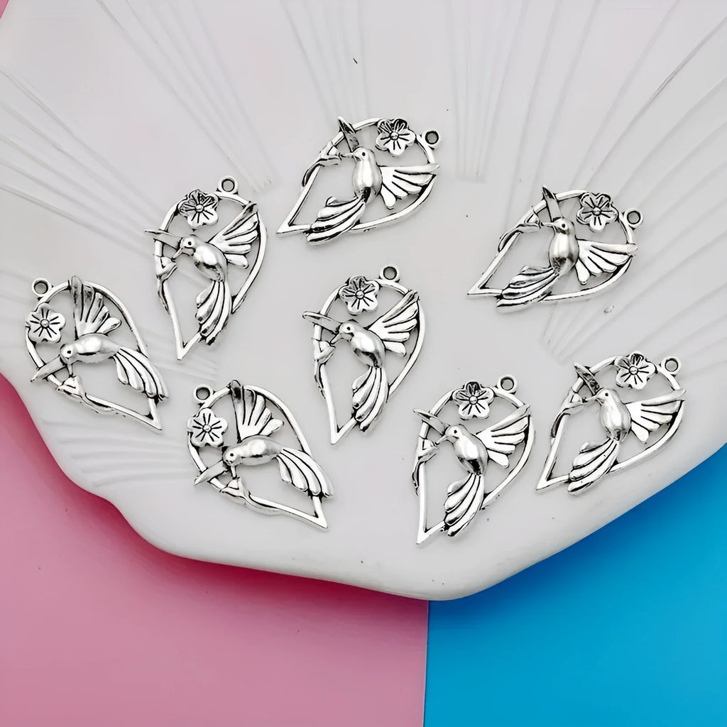 Alloy flying magpie bird pendant with electroplated finish in colour P234 for DIY jewellery.