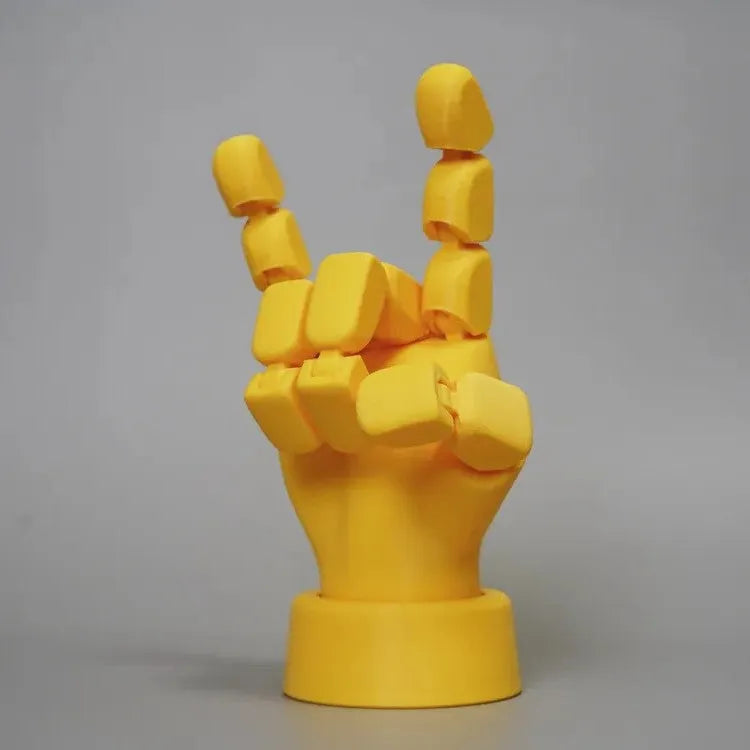 Yellow PLA movable joint hand ornament prop for decorative display.