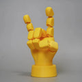 Yellow PLA movable joint hand ornament prop for decorative display.