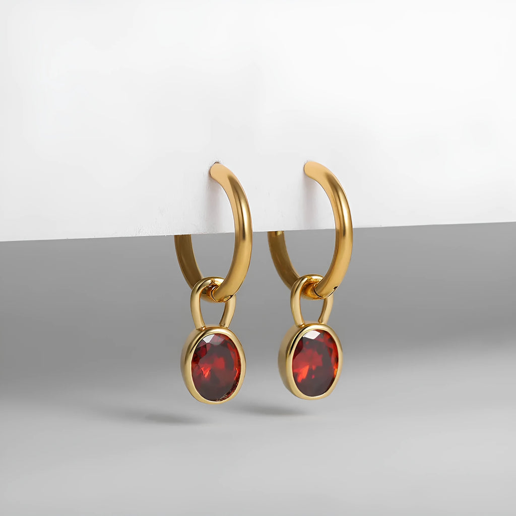 Women's retro oval zircon copper earrings in six colour variations on display