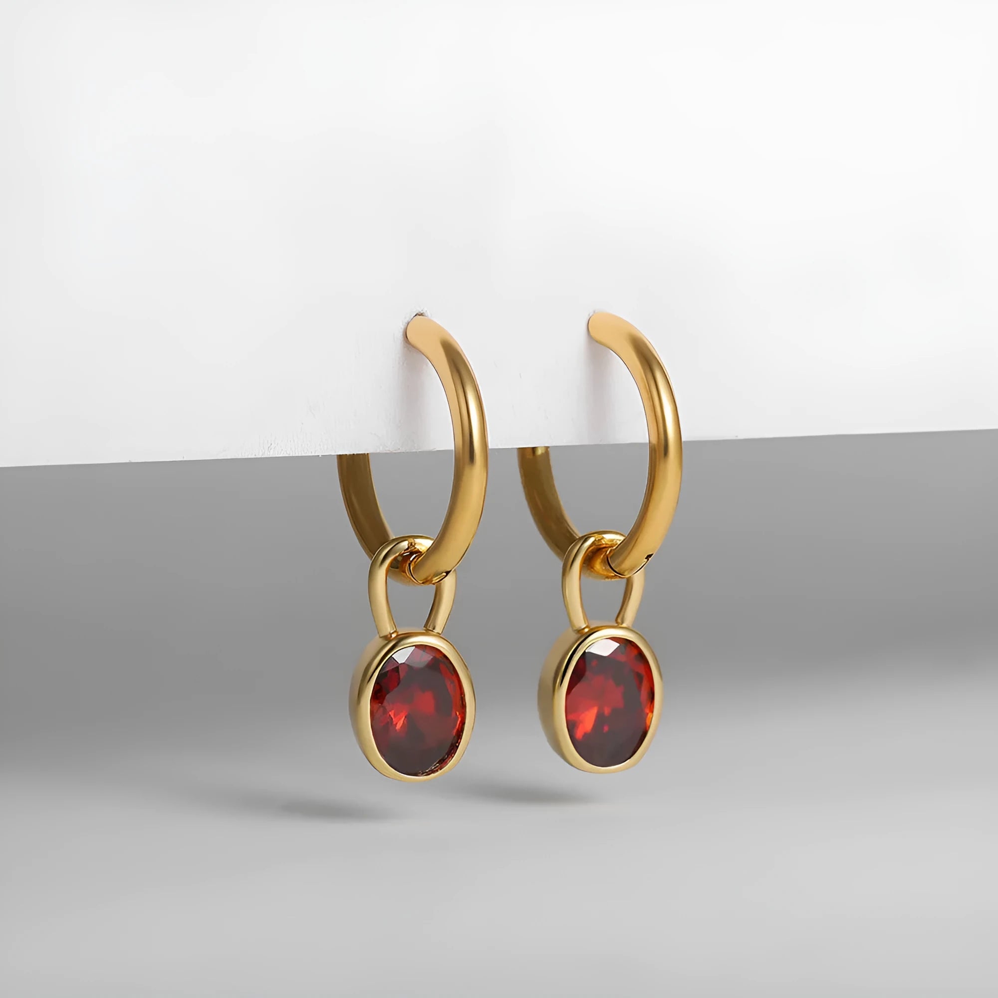 Women's retro oval zircon copper earrings in six colour variations on display