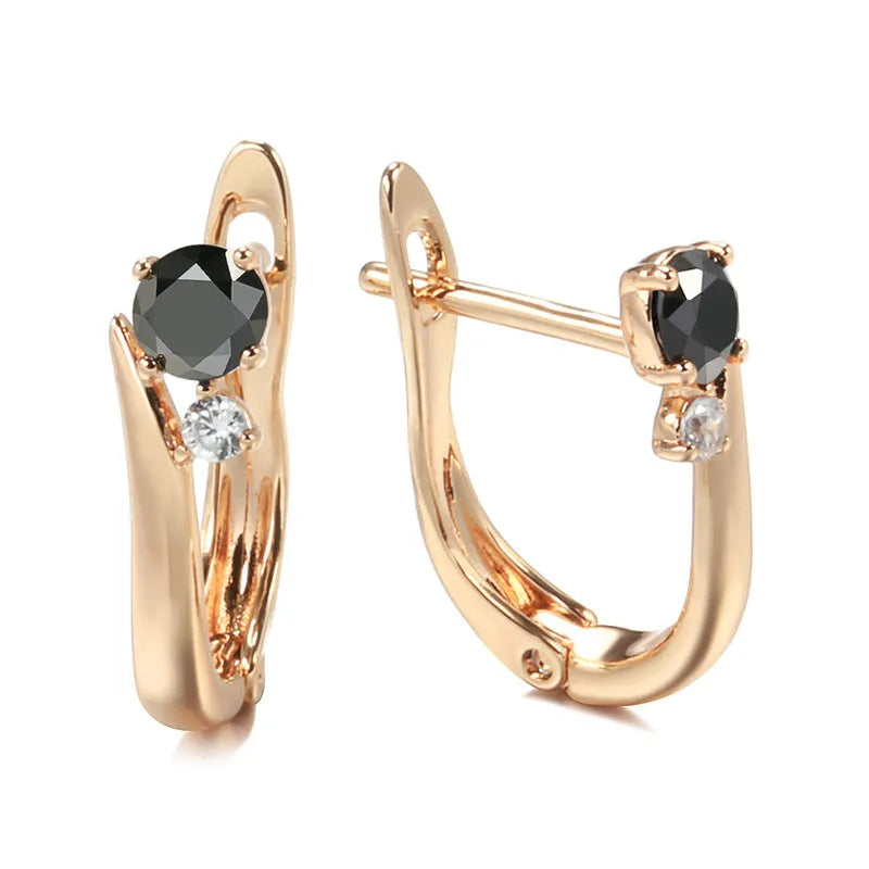 Gold drop earrings with geometric design and black agate stone inlay on copper base