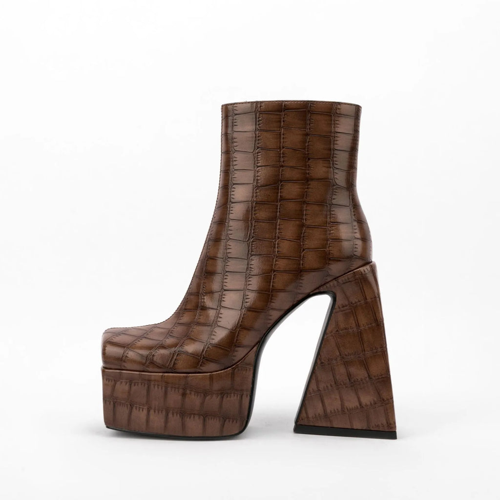 Women's artificial PU ankle boot with a super high heel, shown in a solid colour.