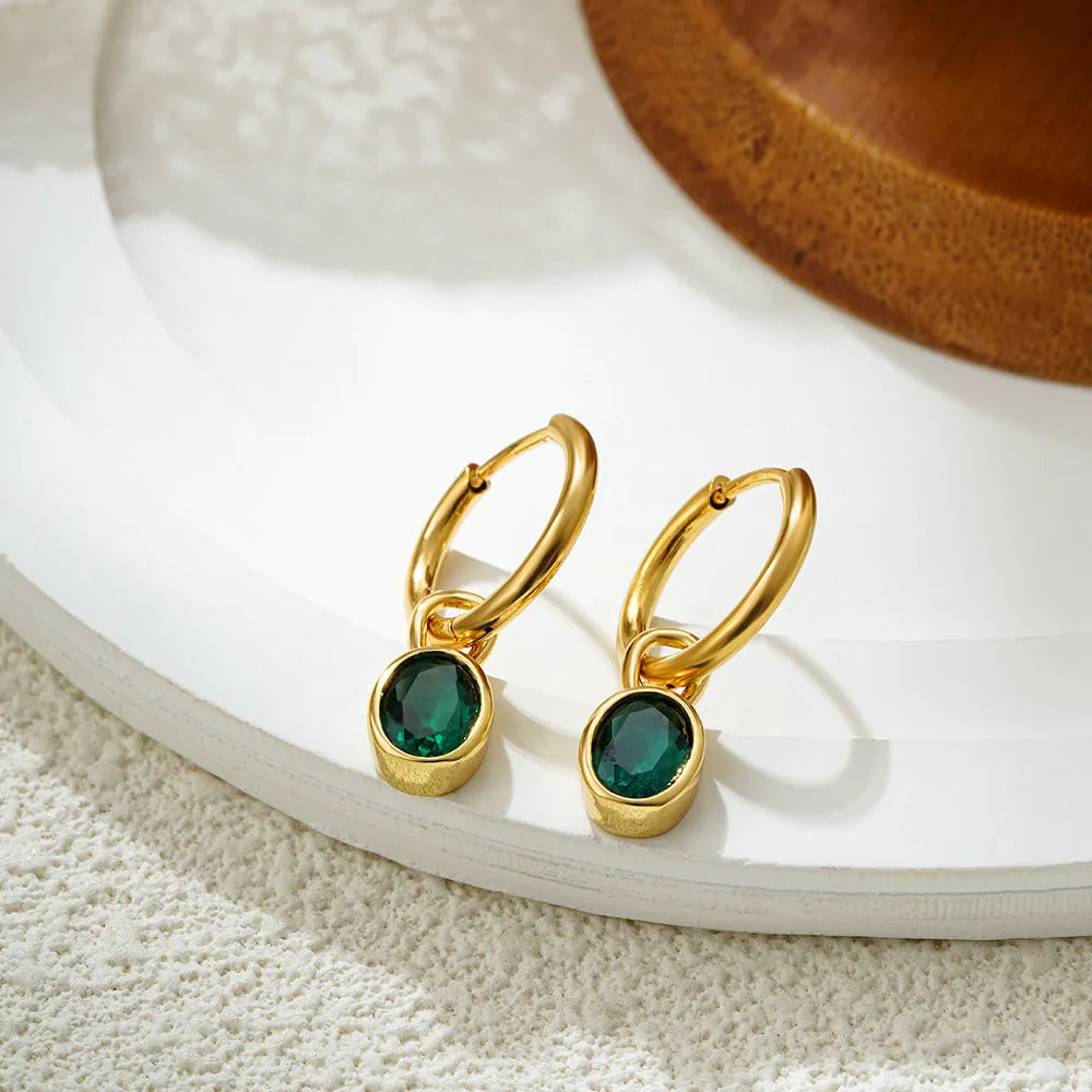 Women's retro oval zircon copper earrings in six colour variations on display