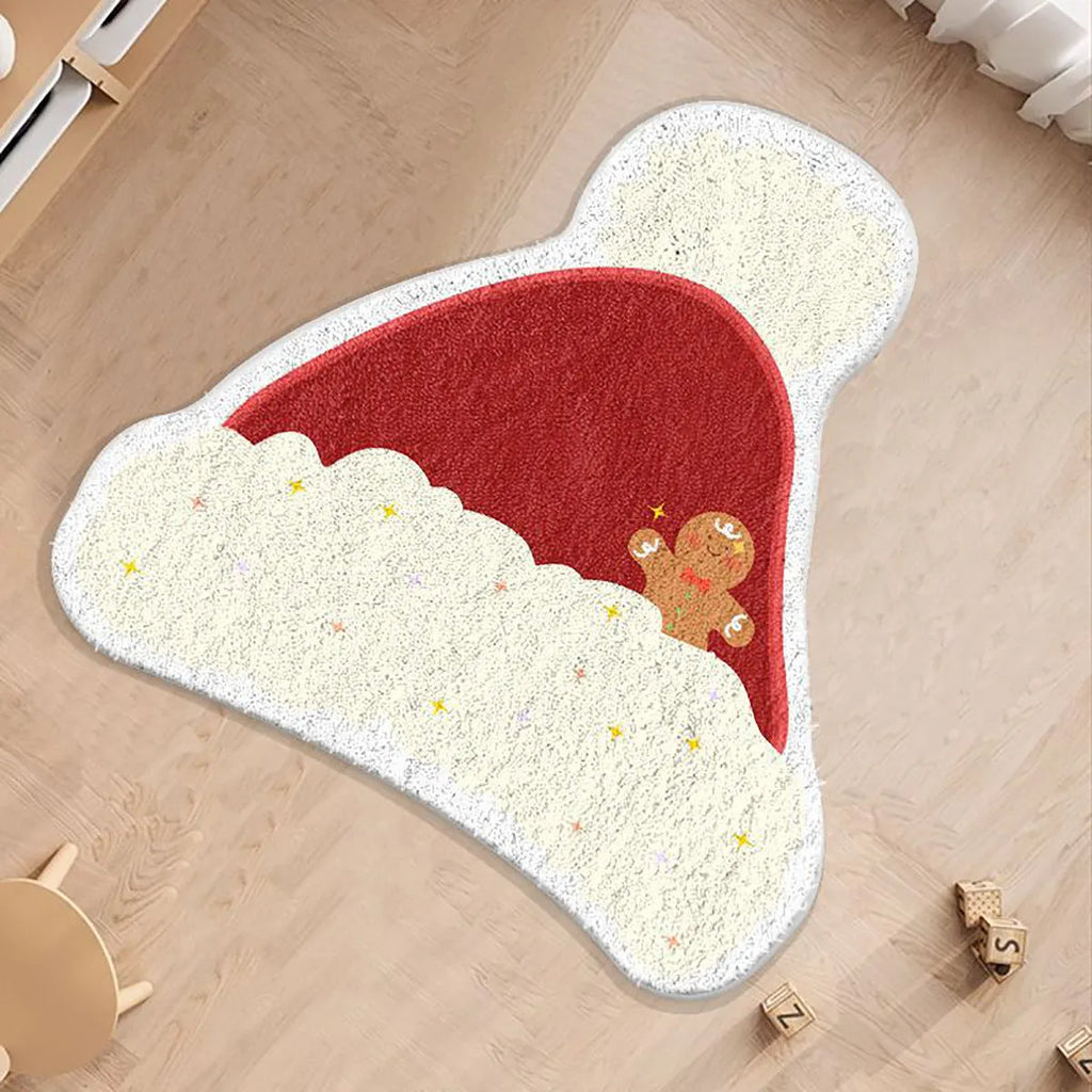 Round alien-shaped Christmas floor mat in imitation cashmere with festive gingerbread man design.