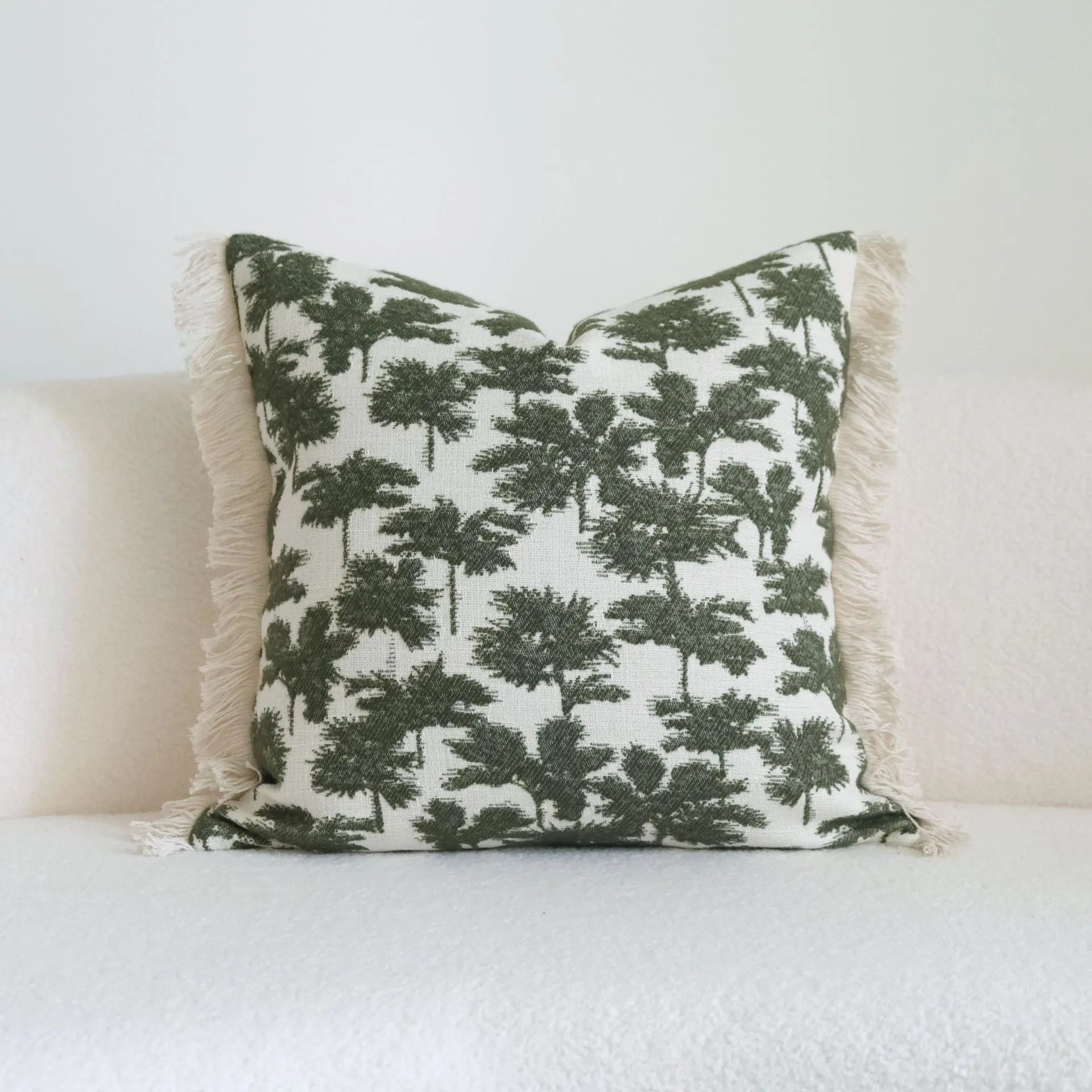Green decorative hotel pillow set with striped and leafy patterns, shown with a matching pillow core.