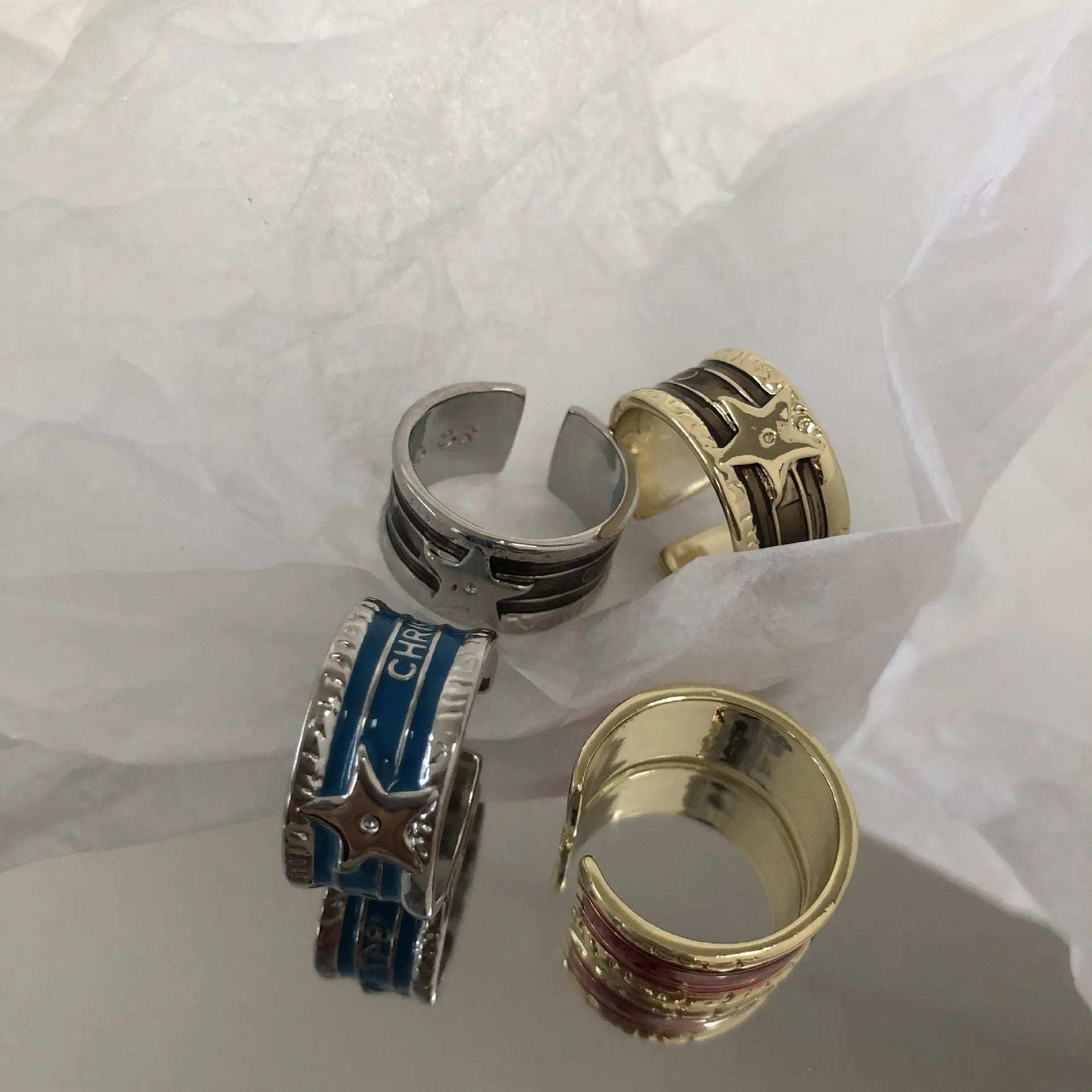 Adjustable copper ring with a geometry shape, distressed finish, and linear design details.
