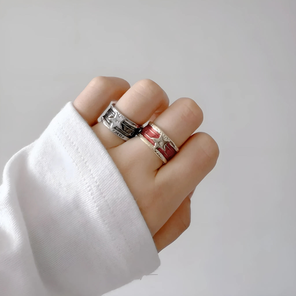 Adjustable copper ring with a geometry shape, distressed finish, and linear design details.