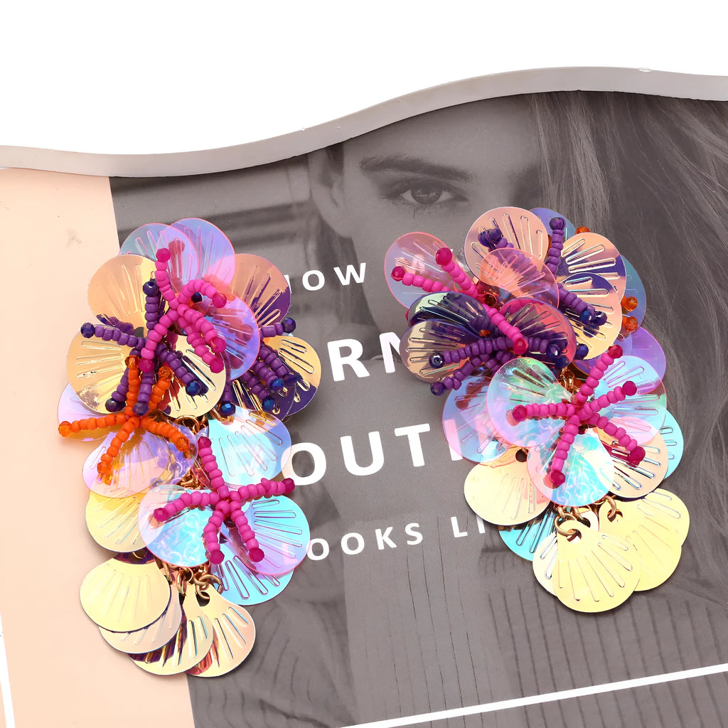 European American exaggerated handmade string bead flower earrings in colourful, rose or purple with leaf details