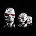 Retro skull stud earrings with red eye ghost head design on alloy base