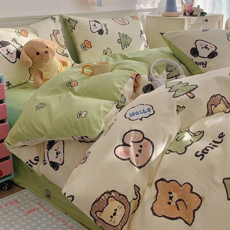Cartoon dog print pure cotton four-piece duvet cover and bed sheet set on a bed.