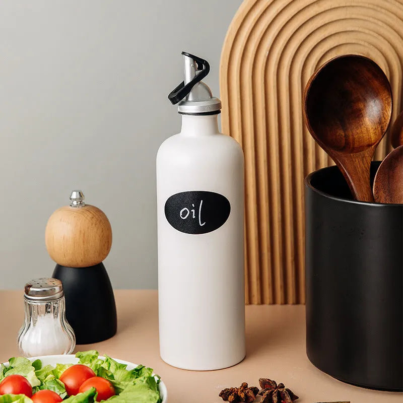 Ceramic oil pot with attached brush in black, coffee or white colours for kitchen oil storage