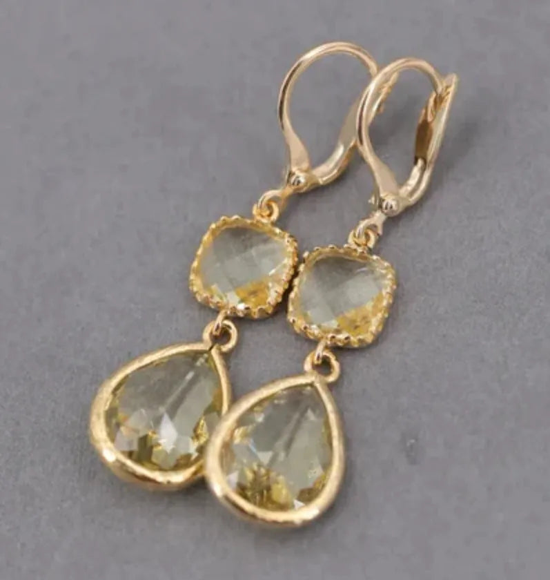 Gold geometric long fringe earrings with crystal water droplet design on copper base