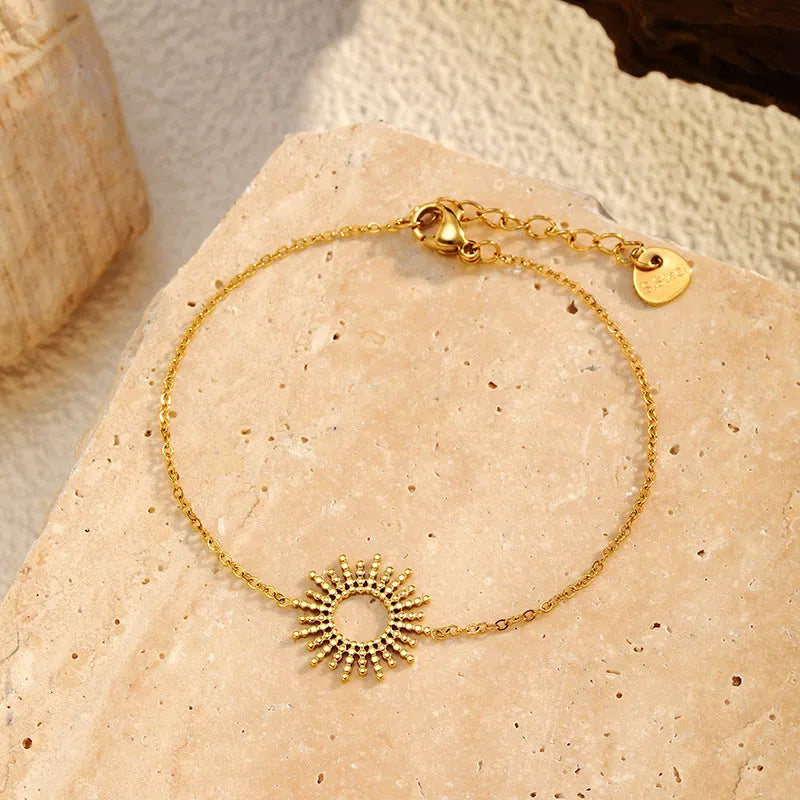 Sunflower theme jewellery set with geometric chain necklace and bracelet in gold colour