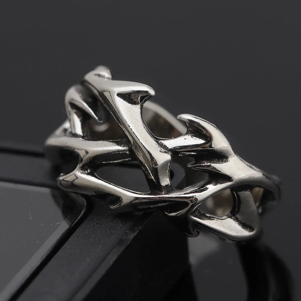 Adjustable copper men's ring with geometric thorn and flower design in J2150 colour.
